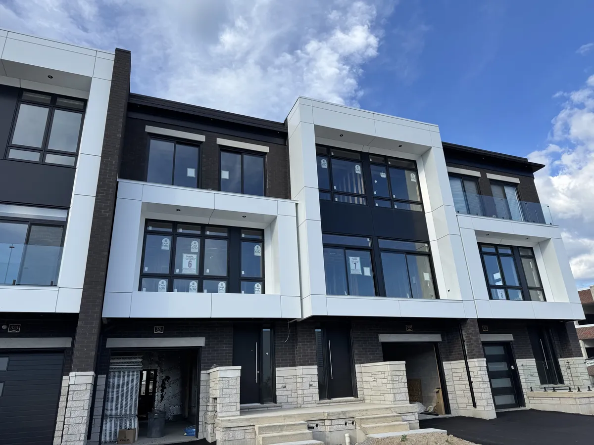 Modern townhouse facade with ACP panels